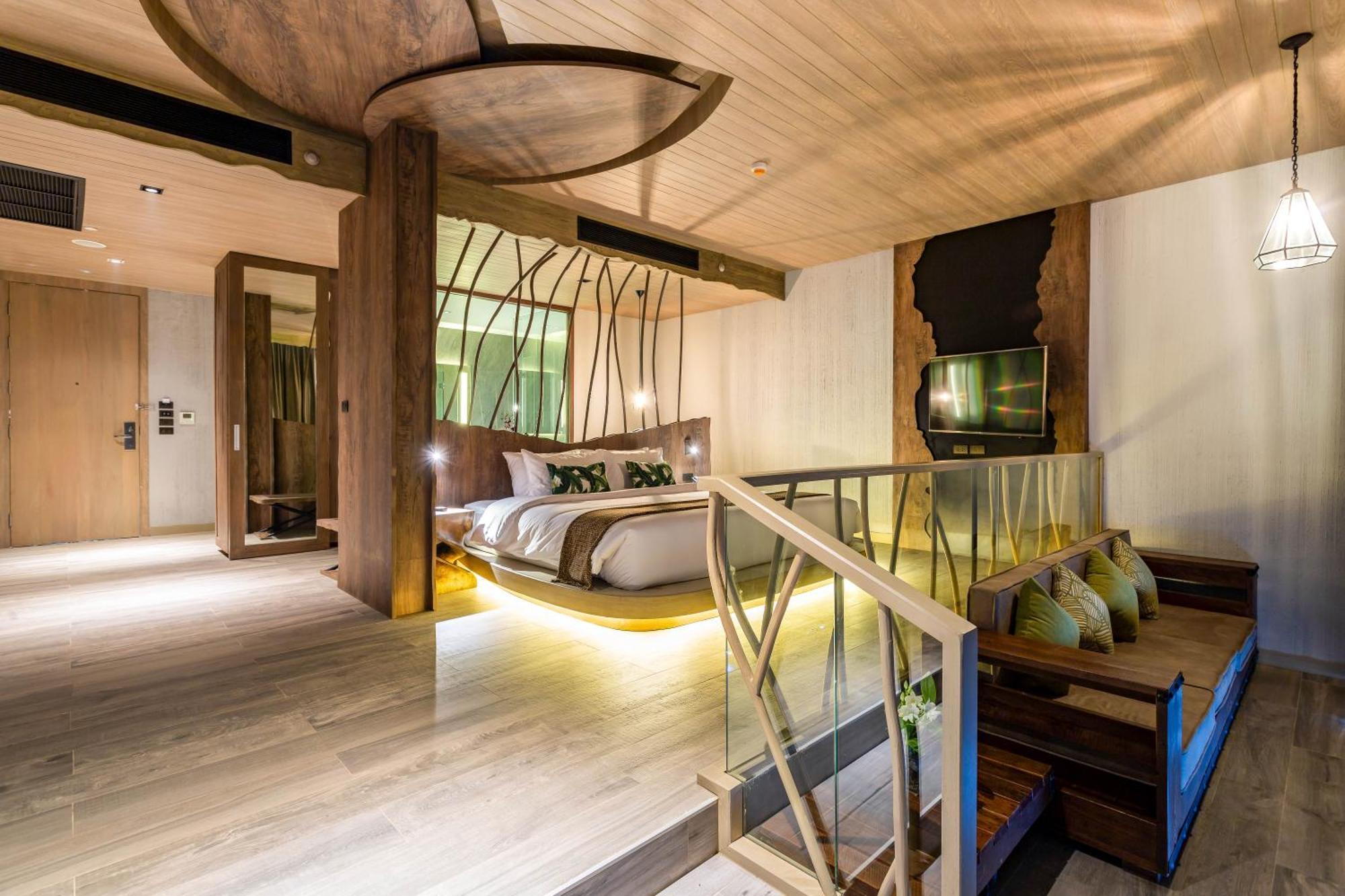 Kalima Resort And Villas Khao Lak Bagian luar foto The interior of a suite at the hotel